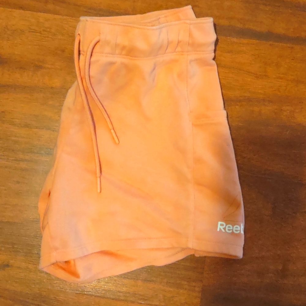Pink Reebok shorts size M